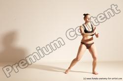 Underwear Martial art Woman White Moving poses Average long colored Dynamic poses Academic